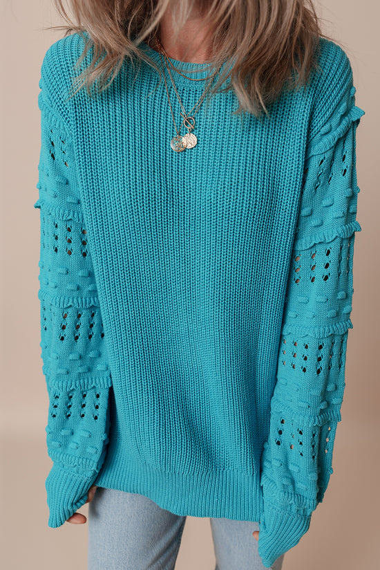 Pull turquoise à manches bulles et œillets à volants