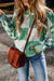 Mint green sweater with dropped shoulders and plaid print