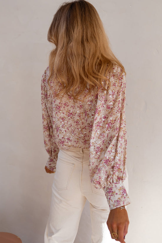 V -neck pink shirt and bishop sleeves with floral print