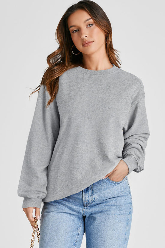 Light gray plain sweatshirt with dropped shoulders and round neck