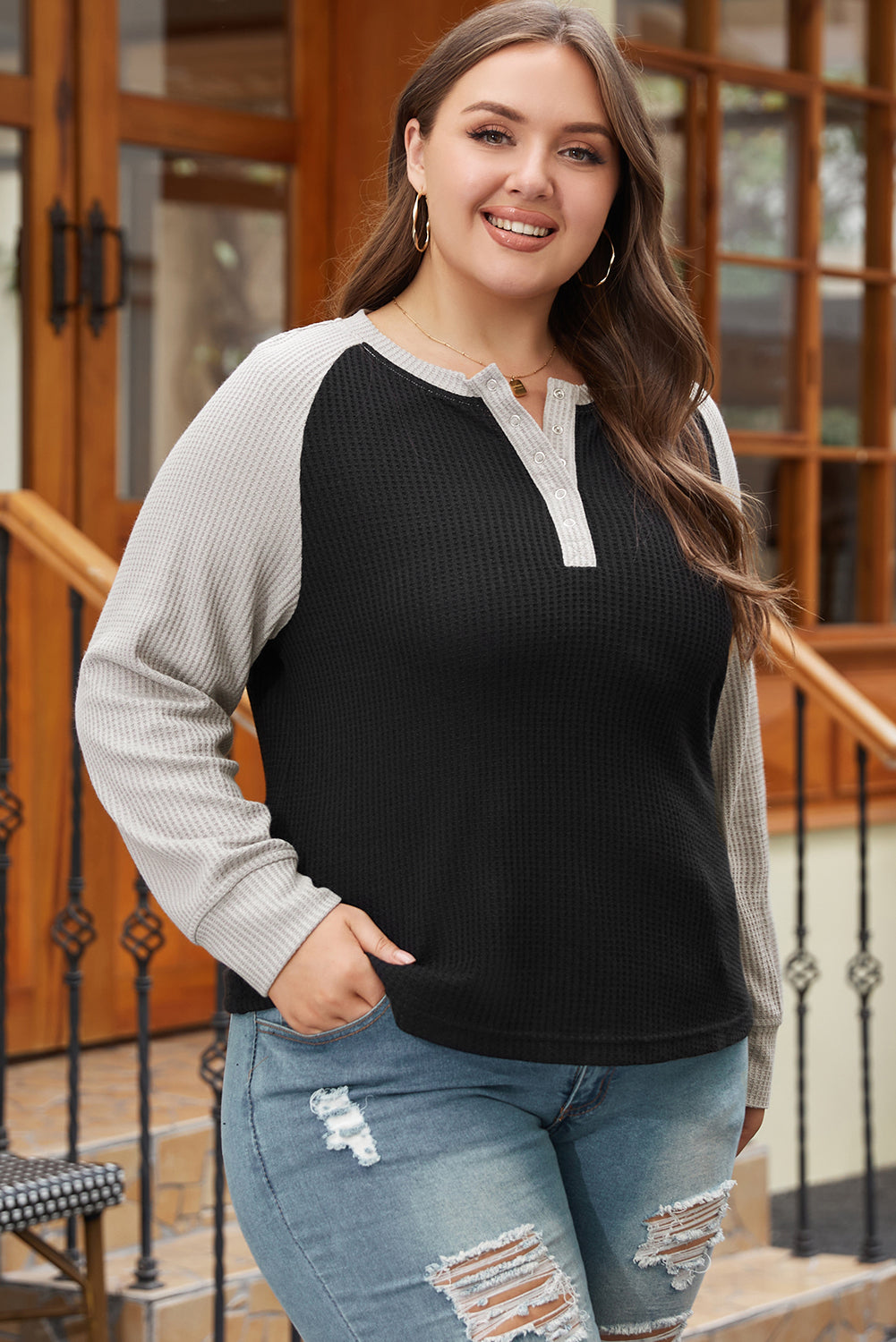 Large large size button in black contrasting knitting