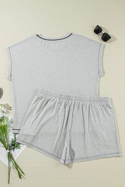 Grey set with cuffed sleeves and contrasting stitching shorts