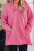 Hot pink textured sweatshirt with zip neck and kangaroo pocket