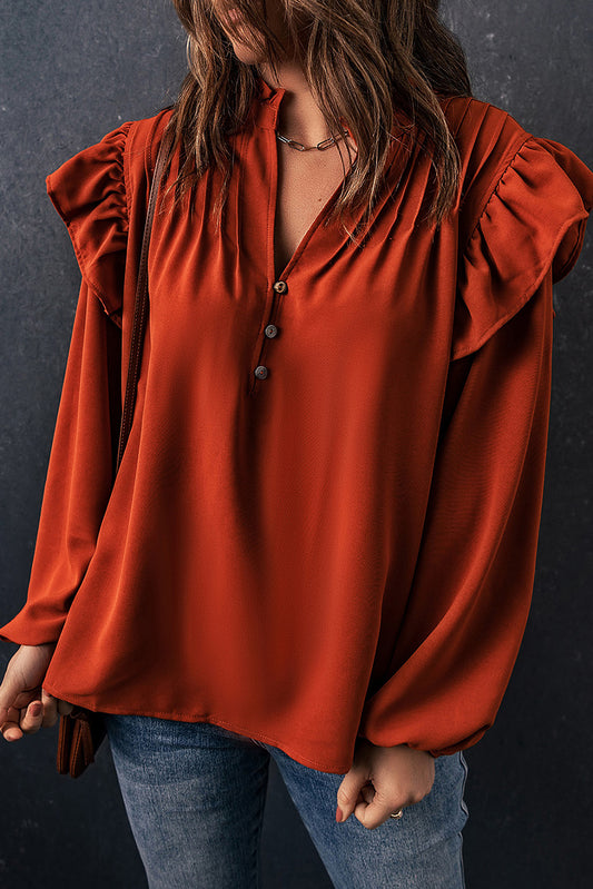 Blusa con el cuello en V planchado con volantes de color naranja