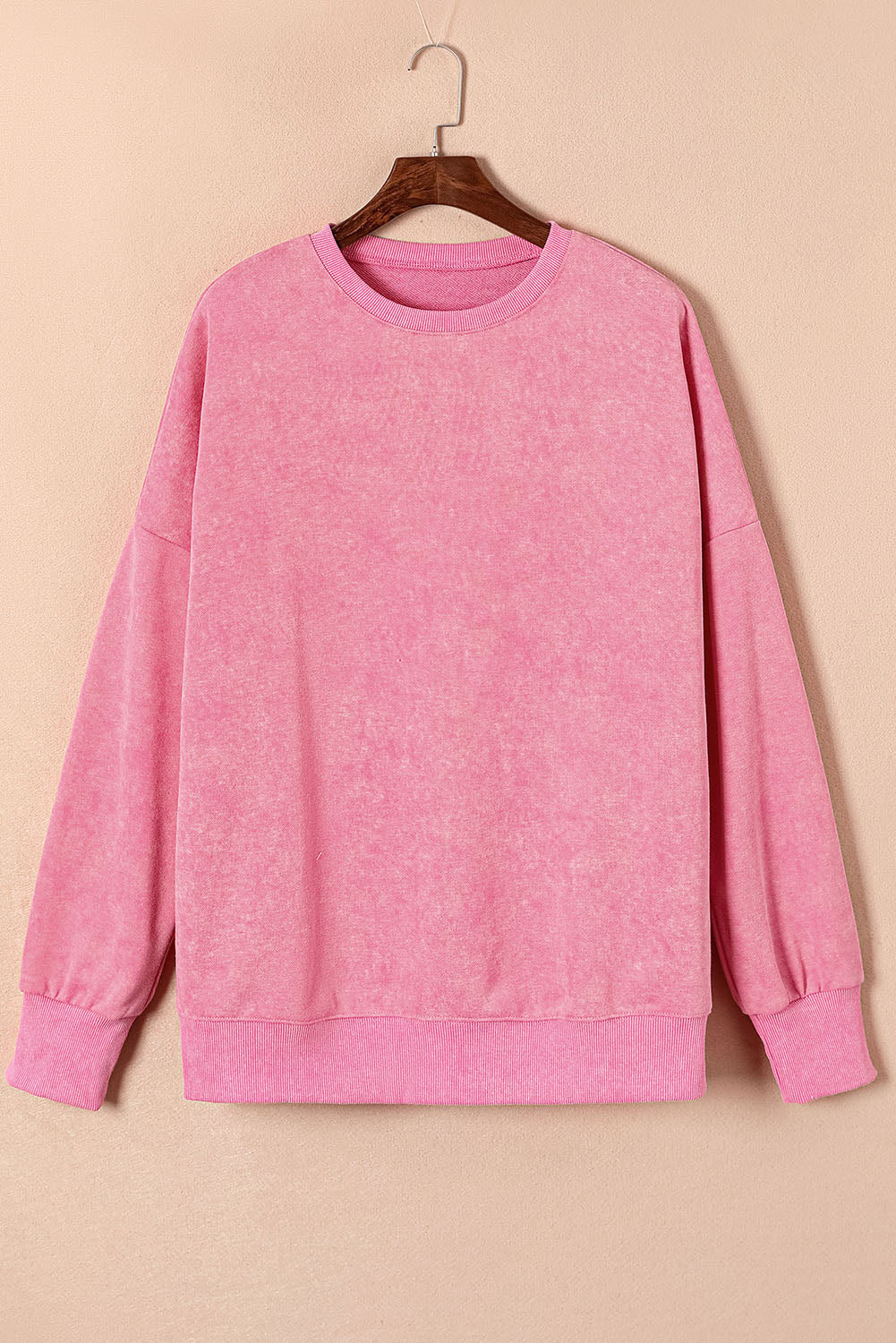 Sweat-shirt oversize rose à épaules tombantes et bordure côtelée