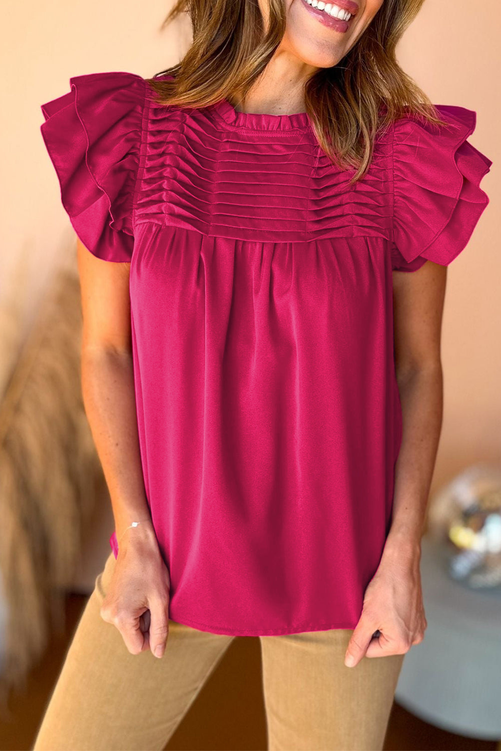 Blouse à manches volantées smockées rouge rose