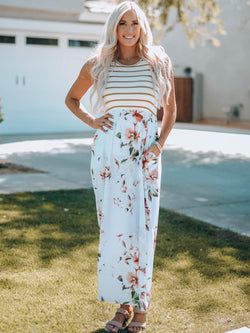 Vestido blanco largo sin manga con estampado floral y rayas con bolsillo