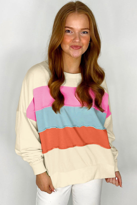 White crew neck sweatshirt with dropped shoulders in color block patchwork