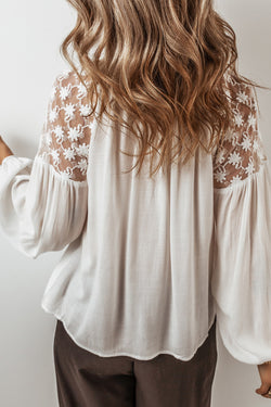 White blouse in floral lace *