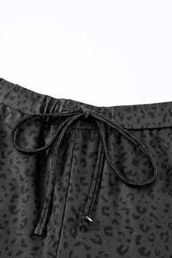 Pantalones de jogging de leopardo negros y ventos