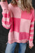 Large pink sweater for a low -low striped color block