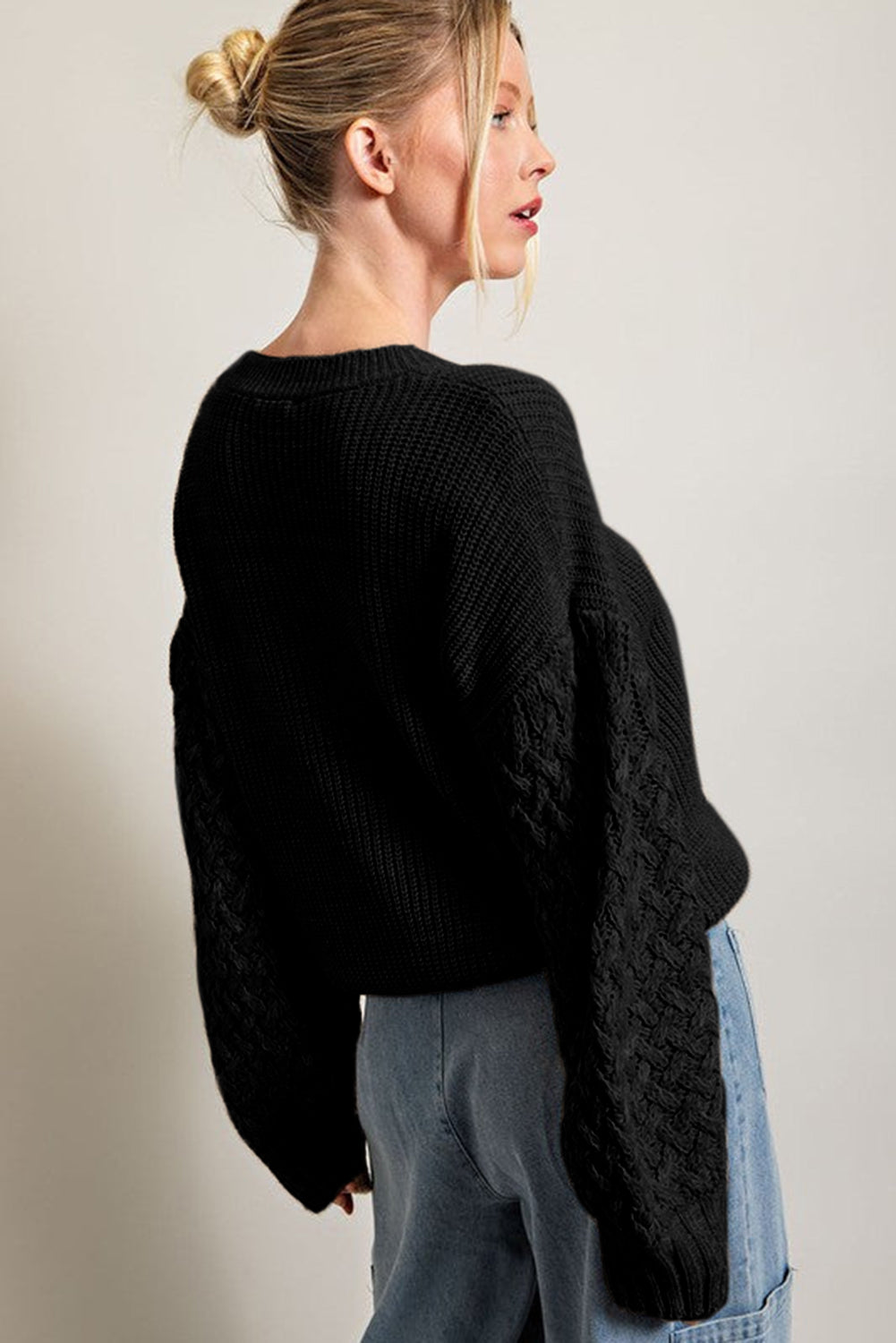 Pull d'épaule à manches en tricot noir