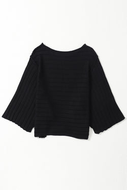 Dolman Pull in black ribbed knitting with exposed seams