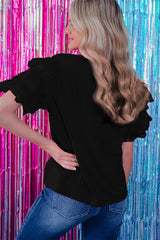 Blouse noire à manches volantées en tulle-A WOMAN WE LOVE