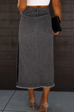 MIDI Skirt in black denim with raw edges and side slits