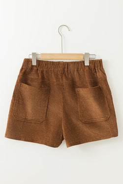 Vintage brown corduroy shorts with elastic waist and back pockets