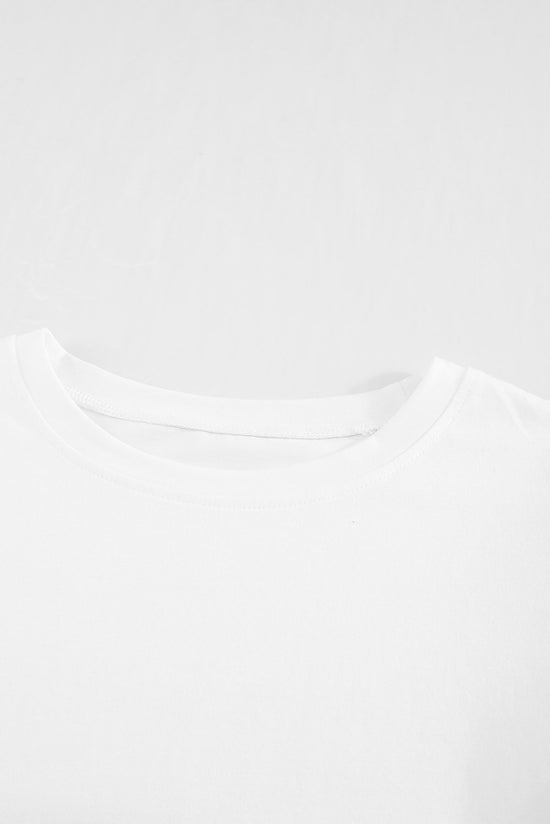 T-shirt blanc à manches volantées et ajourées