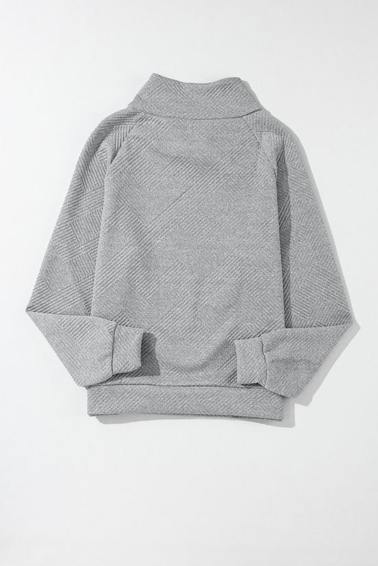 Grey textured sweatshirt with mock neck and asymmetrical buttons