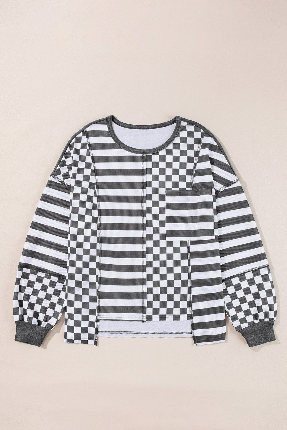 Chemisier gris foncé à poches et manches lanternes en patchwork rayé en damier