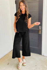 Ensemble t-shirt à manches courtes et pantalon large en tricot texturé de couleur noir-A WOMAN WE LOVE