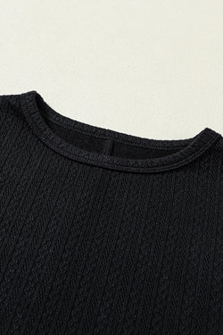 Black long puff sleeve top in faux knit jacquard