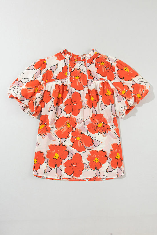 Blusa de manga suelta naranja y cuello volador y patrón floral