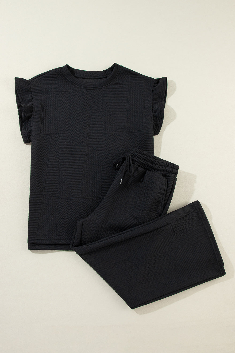 Black summer top with ruffle sleeves and loose short pants set