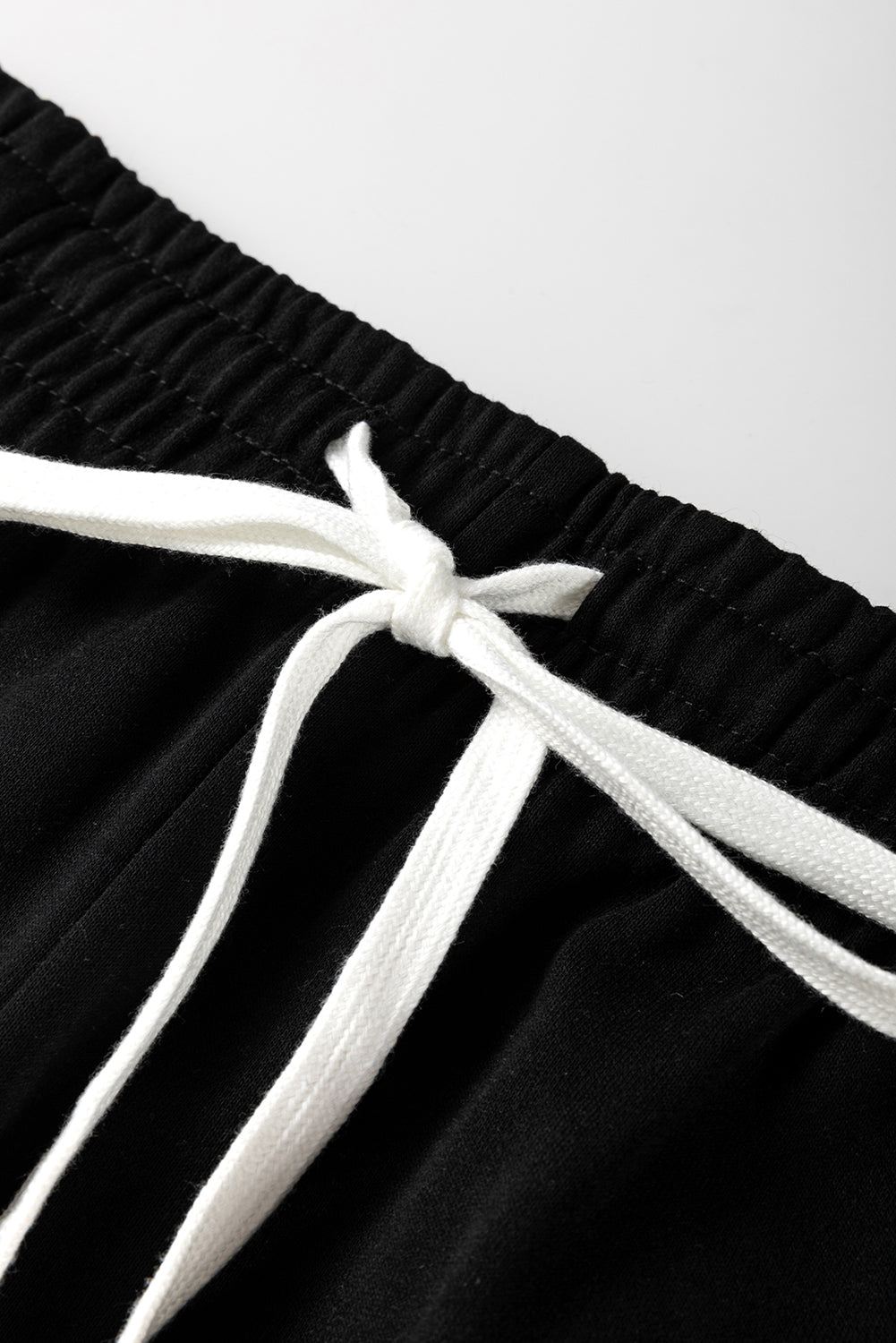 Ensemble pull à épaules tombantes et pantalon de jogging noir à rayures-A WOMAN WE LOVE