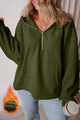 Loose-fitting half-zip hoodie with fleece-lined kangaroo pockets in moss green