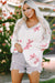 White lightweight knit hoodie with floral print