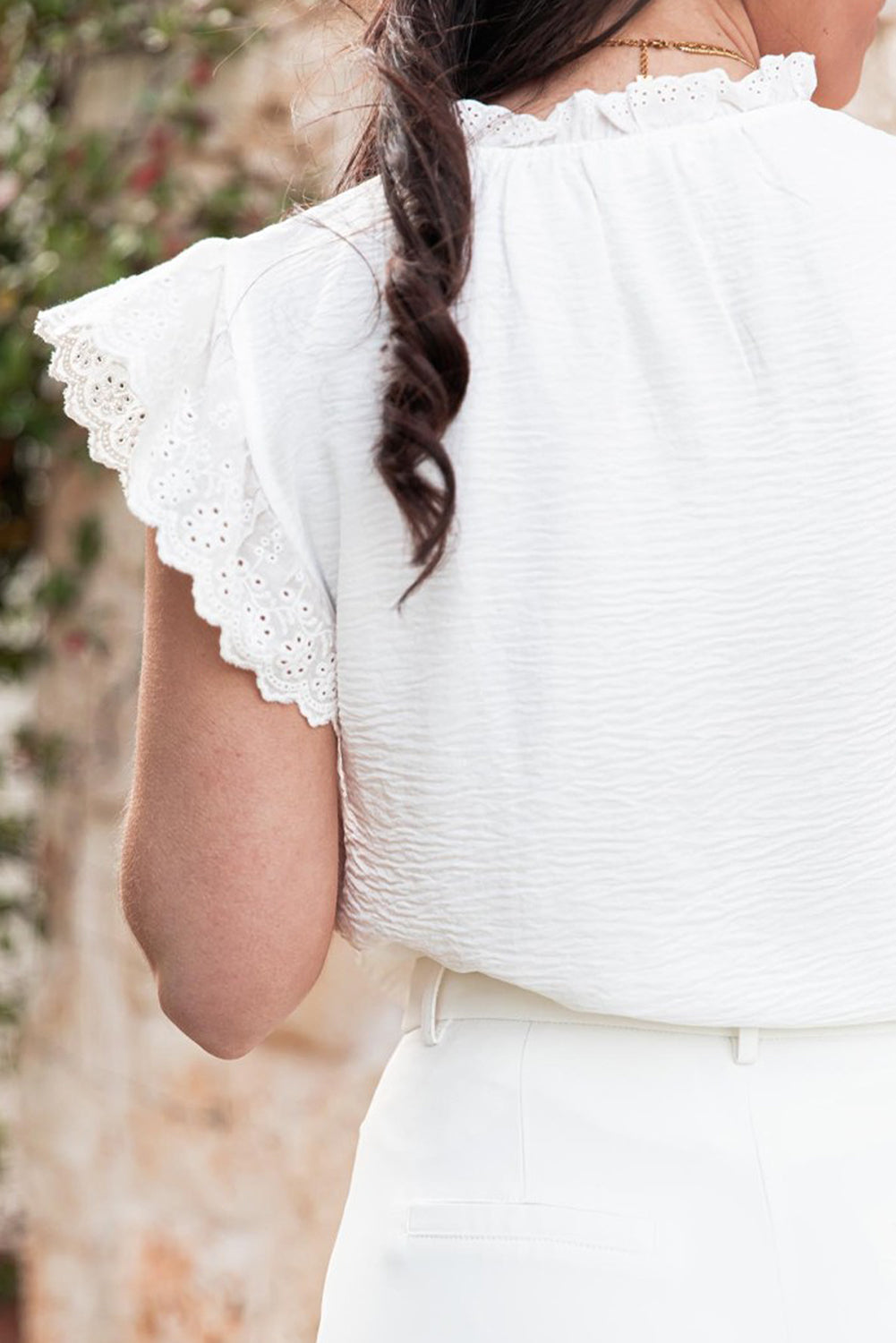 White textured blouse with embroidered ruffles *