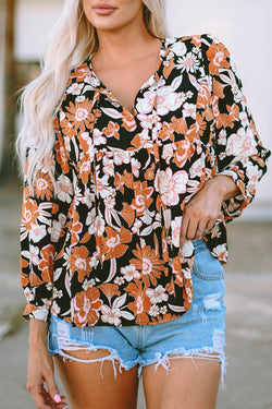 Brown babydoll blouse with floral print and 3/4 sleeves