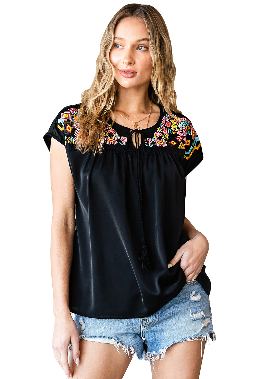 Blouse à manches courtes brodées géométriques noires