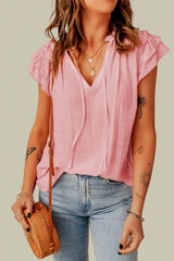 V -collar high in V -collar with tightening cord and flyers on several levels