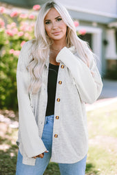 Grey buttoned hooded jacket with contrast knitted sleeves