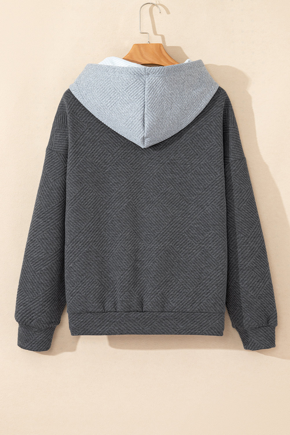 Grey textured hoodie with kangaroo pocket and dropped shoulders