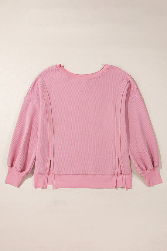 Haut oversize fendu à manches évêque en tricot gaufré rose