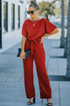 Bright red belted wide leg jumpsuit