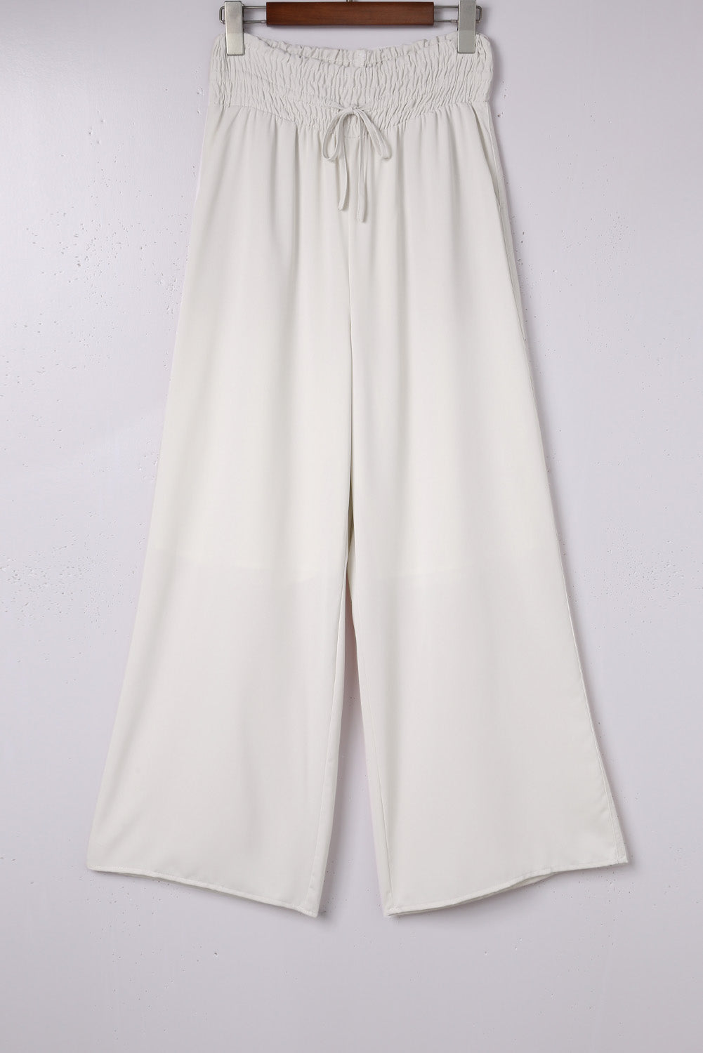 Pantalones anchos de cintura alta con fruncido en beige