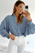 Surprised shirt buttoned with frowned and abstract blue sky