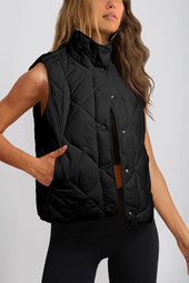 Black quilted vest coat with high collar and buttoned pocket