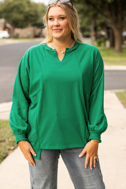 Sweat-shirt vert vif avec coutures apparentes, col cranté et épaules tombantes