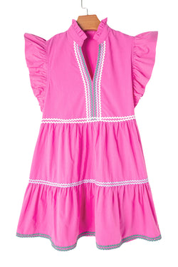 Dress on several levels with V -collar and floating sleeves Colorblock Ric Rac pink strawberry