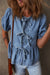 Twilight blue denim shirt tied on the front with bubble and basque sleeves