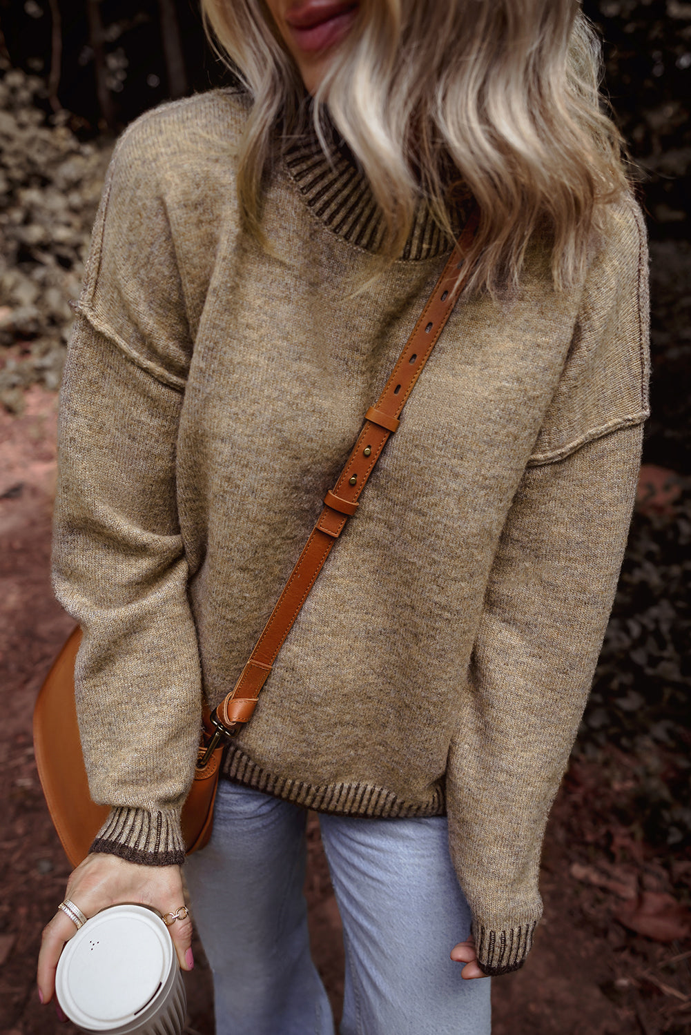 Pale khaki sweater with dropped shoulders and high neck with contrasting trim