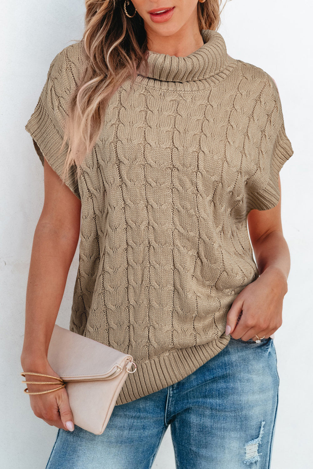Rolled-collar sweater and bat handle in twisted French beige knitted