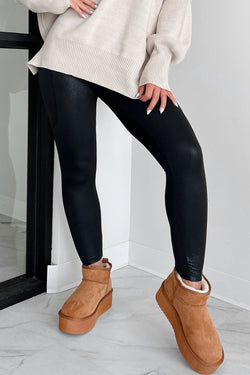 Black high waisted crossover leggings with pockets