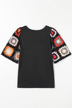 Black high with short sleeves in crochet *