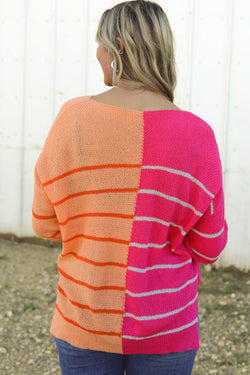 Loose fit knitted sweater with multi-colored stripes