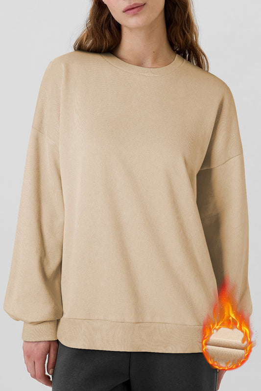 High-low sweatshirt with dropped shoulders and solid apricot fleece lining